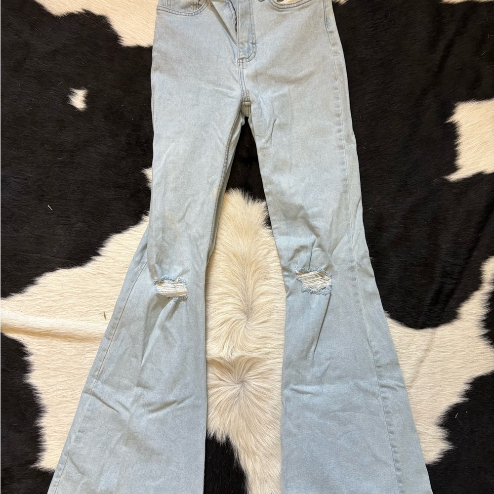 Bell bottom distressed jeans size 25
